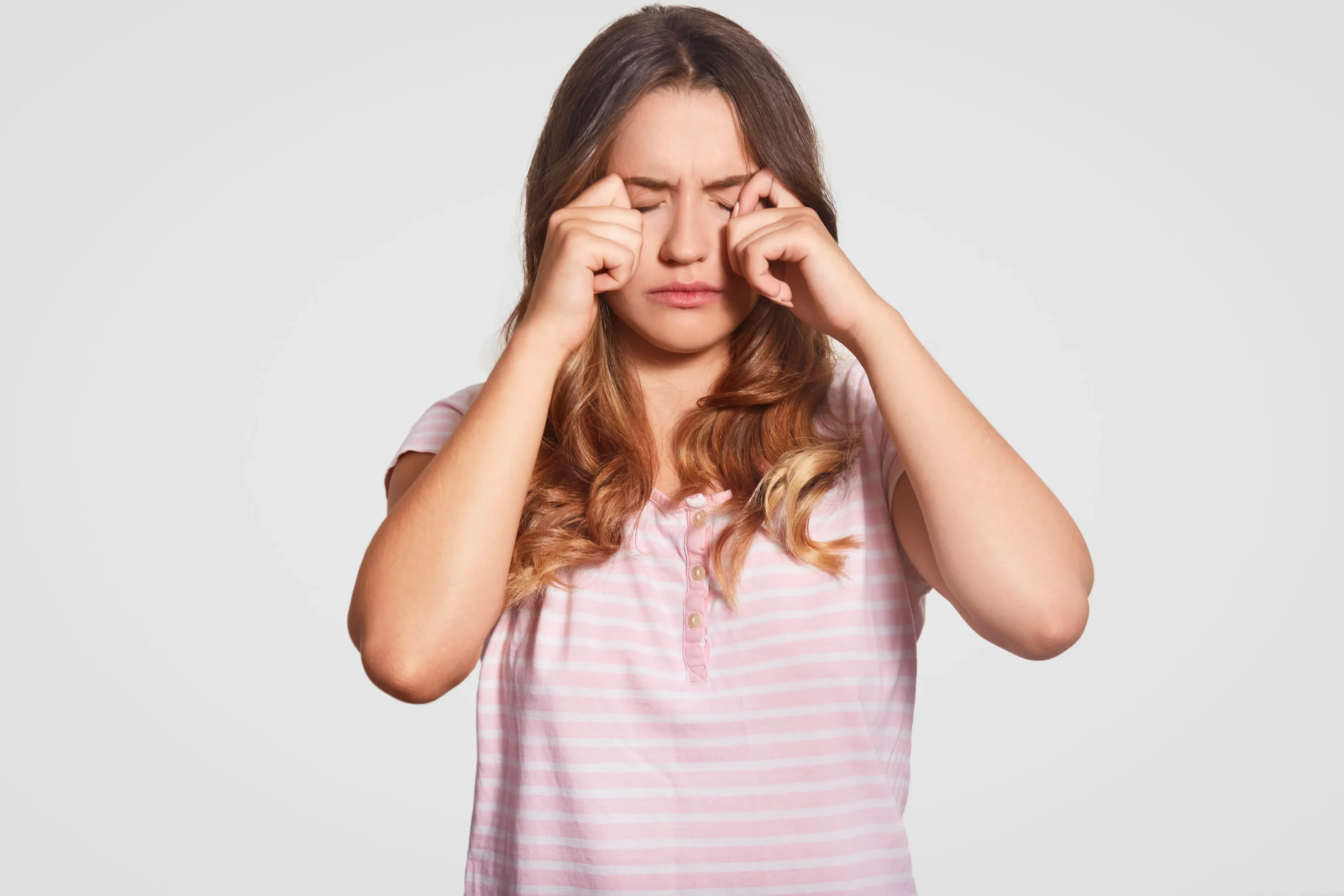 photo-displeased-young-girl-rubs-eyes-being-low-spirit-wears-casual-domestic-clothes-poses-white-woman-had-bad-sleep-night-bedding-concept-people-tiredness